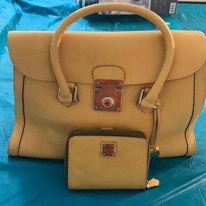 Almost New Dooney and Bourke Satchel with matching wallet. Rich Mustard Color